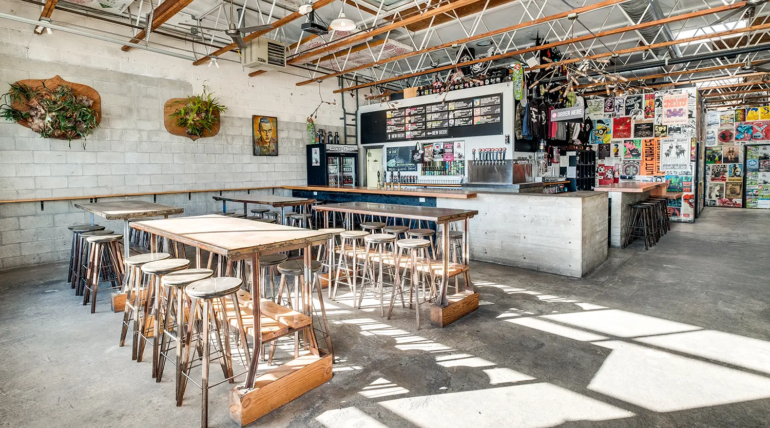industrial-brewery-taproom-long-tables